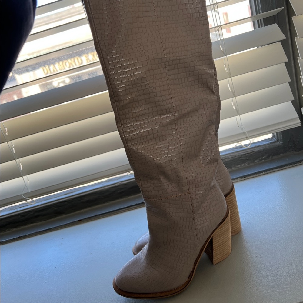 Knee high snakeskin boots